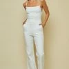Blue Blush Jumpsuits The Lacey White Tie Back Denim Bell Bottom Jumpsuit